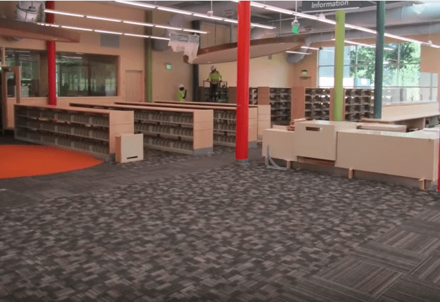 patterned carpet in gray covers library floor